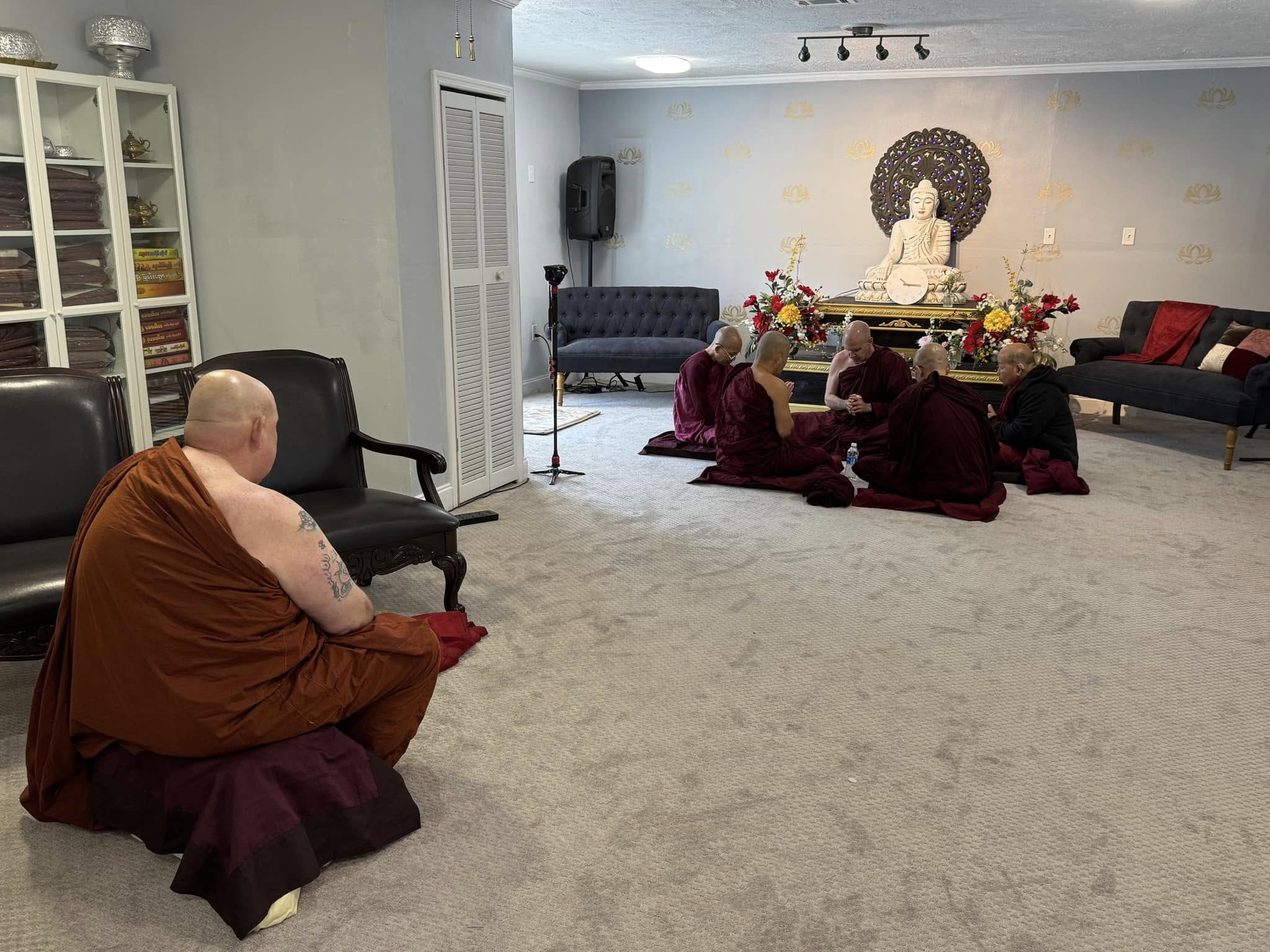 Sāmaṇera Dhammarasa near the Pāṭimokkha hall after ordination