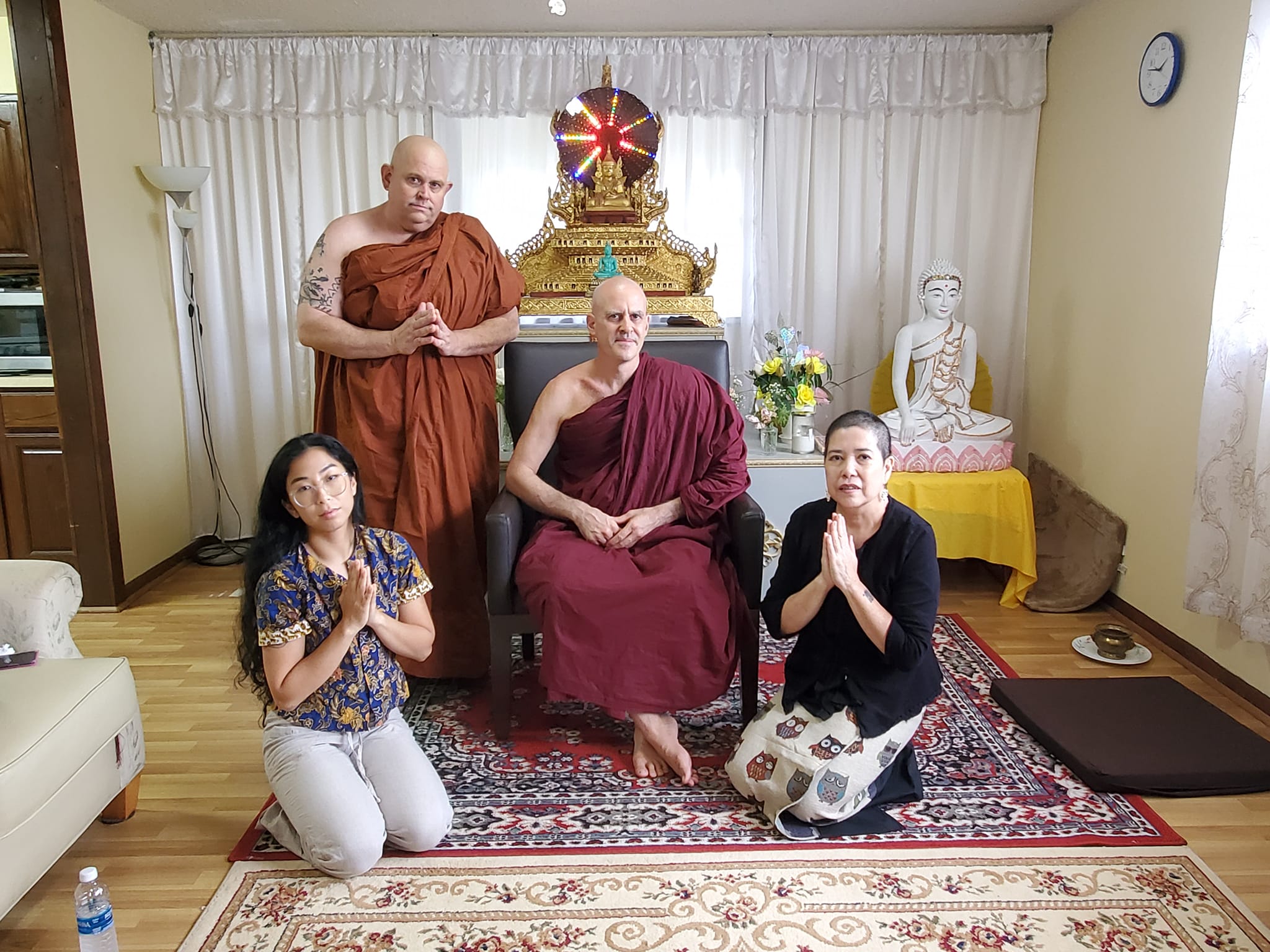 Sāmaṇera Dhammarasa with his family after ordination